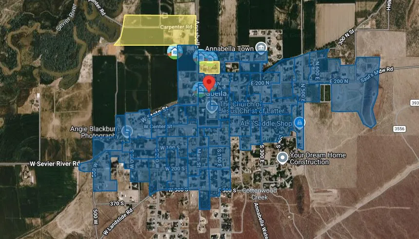 Satellite map of Annabella with much of the town shaded blue and one field at the edge shaded yellow.