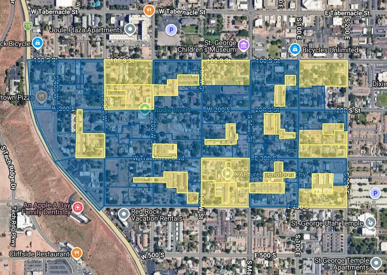 Satellite map of downtown St. George around Main Street and the temple, with blocks shaded blue and yellow.
