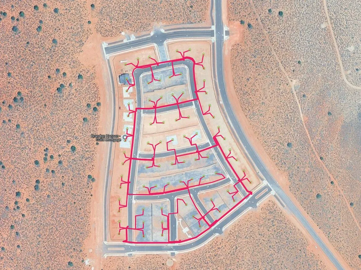 Satellite view of the Firelight SunRiver subdivision, the fiber route drawn as pink lines branching from the streets to each lot.