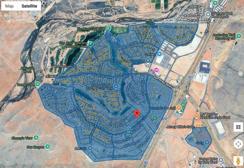 Satellite map of the SunRiver community along Sun River Parkway, its streets shaded blue, with the golf course and desert around it.